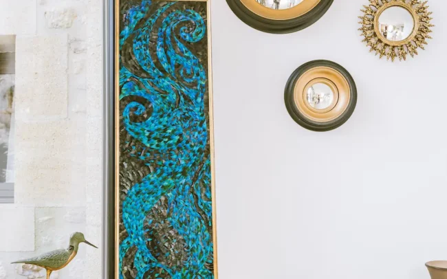 Painting Depths of the Sea displayed on a windowsill