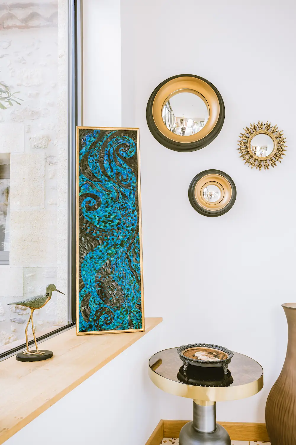 Painting Depths of the Sea displayed on a windowsill